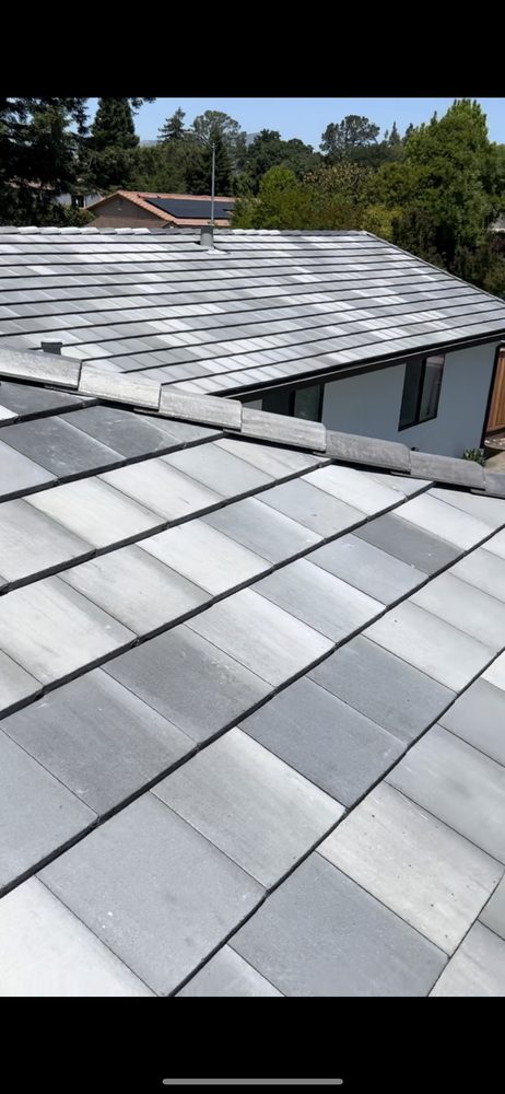 Slide of East Bay Roofing