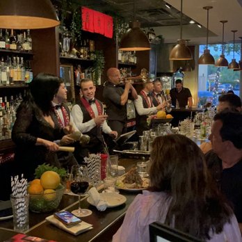 Cafe La Trova - Bartenders add to the fun! - Cocktail Bars Near Me - Miami, Florida