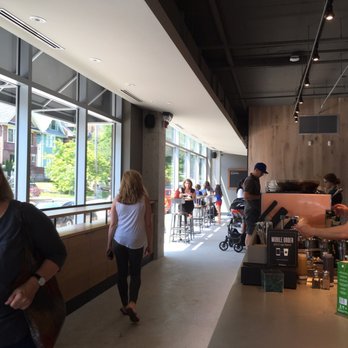 Starbucks - people walking through a coffee shop - Coffee & Tea Near Me - Toronto, Ontario