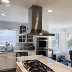 MM Appliance Installation - Island hood with roof vent