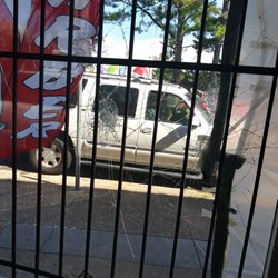 Four Seasons Pizzeria - Cracked window for the ex employee LOL