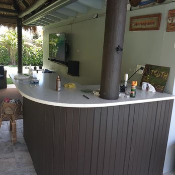 Construction On Demand - an outdoor bar with a television - General Contractors Near Me - Deerfield Beach, Florida Construction On Demand - an outdoor bar with a television - General Contractors Near Me - Deerfield Beach, Florida