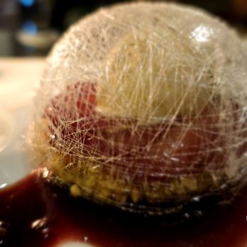 Marmalade - Poached pear encased in spun sugar - Caribbean Near Me - San Juan, Puerto Rico Marmalade - Poached pear encased in spun sugar - Caribbean Near Me - San Juan, Puerto Rico