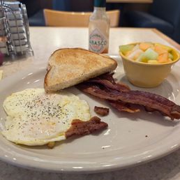 The classic breakfast eggs, bacon, fruit subbed for potatoes The classic breakfast eggs, bacon, fruit subbed for potatoes