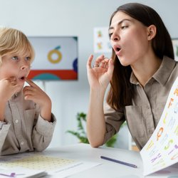 Speech Within Reach - Speech Therapist with client working on articulation.