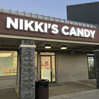 Nikki's Candy - Exterior view of Nikki's Candy store in Reno, NV, showing the large sign, entrance door, and surrounding facade. - Candy Stores Near Me - Reno, Nevada