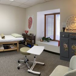 Energy Flow Acupuncture & Wellness Center - Welcome to one of our two naturally lit treatment rooms where you will relax on a heated bed during your session.