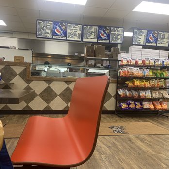 Brothers Pizza - a red chair in front of the counter - Pizza Near Me - Mc Sherrystown, Pennsylvania Brothers Pizza - a red chair in front of the counter - Pizza Near Me - Mc Sherrystown, Pennsylvania