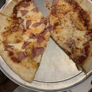 Photo of Pazzo's Pizzeria - Avon, CO, United States. Medium cheese and Canadian bacon pizza