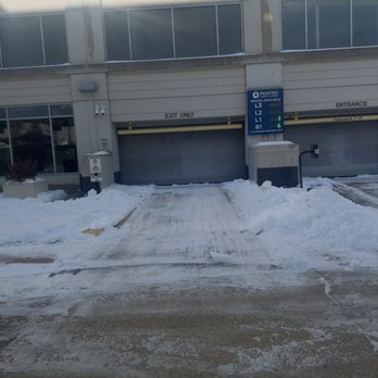 Pleasant View Property Services  - Garage door entry and exit driveway - Snow Removal Near Me - Annapolis, Maryland