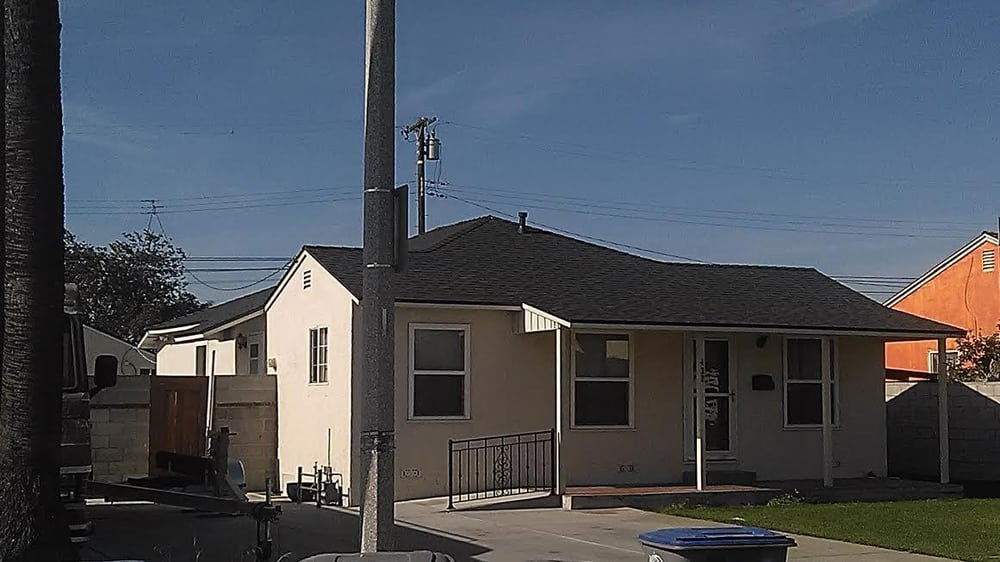 Slide of Espino Roofing