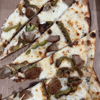 Burattino Brick Oven Pizza - The pizza we ordered. Just kind of bleh nothing like IG photos. It tastes as it looks: hard and dry - Pizza Near Me - Carson, California