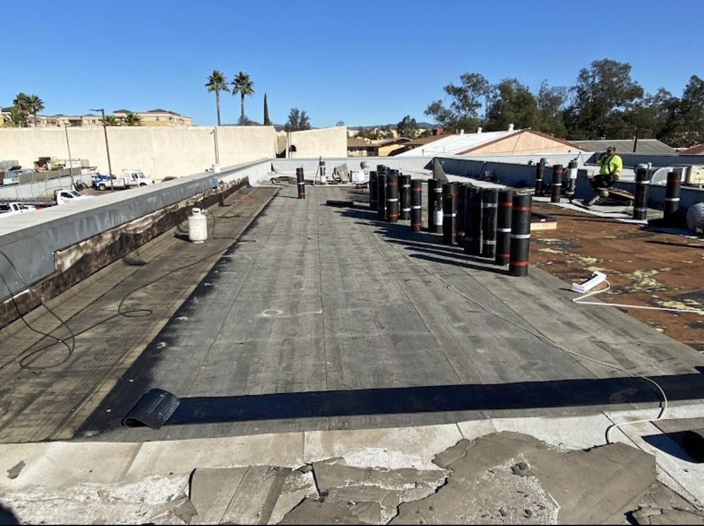 Slide of Delino’s Roofing & Remodeling