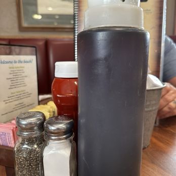 Henry's Restaurant - Look at the size of the syrup bottle! - American Near Me - Kill Devil Hills, North Carolina