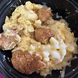 A very expensive cup of macaroni and 3 1/4 chunks of chicken