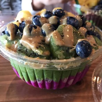 Playa Bowls - Half Pitaya and Half Green (Kale) Bowl with blueberries, pineapple, kiwis, and peanut butter - Acai Bowls Near Me - Millburn, New Jersey
