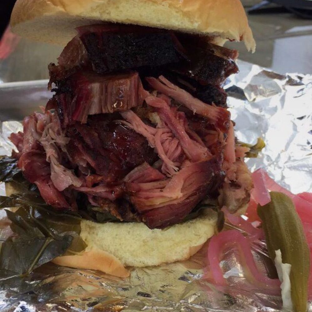 The Redneck BBQ Lab - Fat Redneck sandwich. Sliced brisket and pulled pork on bun with braised collards. - Barbeque Near Me - Benson, North Carolina The Redneck BBQ Lab - Fat Redneck sandwich. Sliced brisket and pulled pork on bun with braised collards. - Barbeque Near Me - Benson, North Carolina