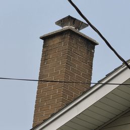 Original chimney with cracked and broken bricks Original chimney with cracked and broken bricks