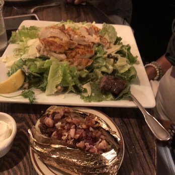 The Steakhouse - Loaded baked Potatoe and Caesar salad with chicken - Steakhouses Near Me - Wells, Maine