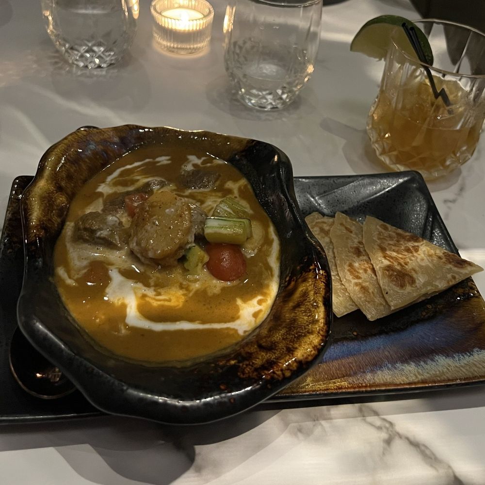 Kalabaw Bar & Kitchen - Kalabaw curry, in a bowl that looked like an oyster - Thai Near Me - Seattle, Washington Kalabaw Bar & Kitchen - Kalabaw curry, in a bowl that looked like an oyster - Thai Near Me - Seattle, Washington