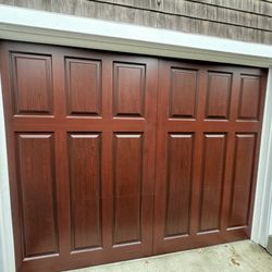 Ron Dulmaine & Sons Garage Doors - Fimbel PVC garage door with factory "stain" finish