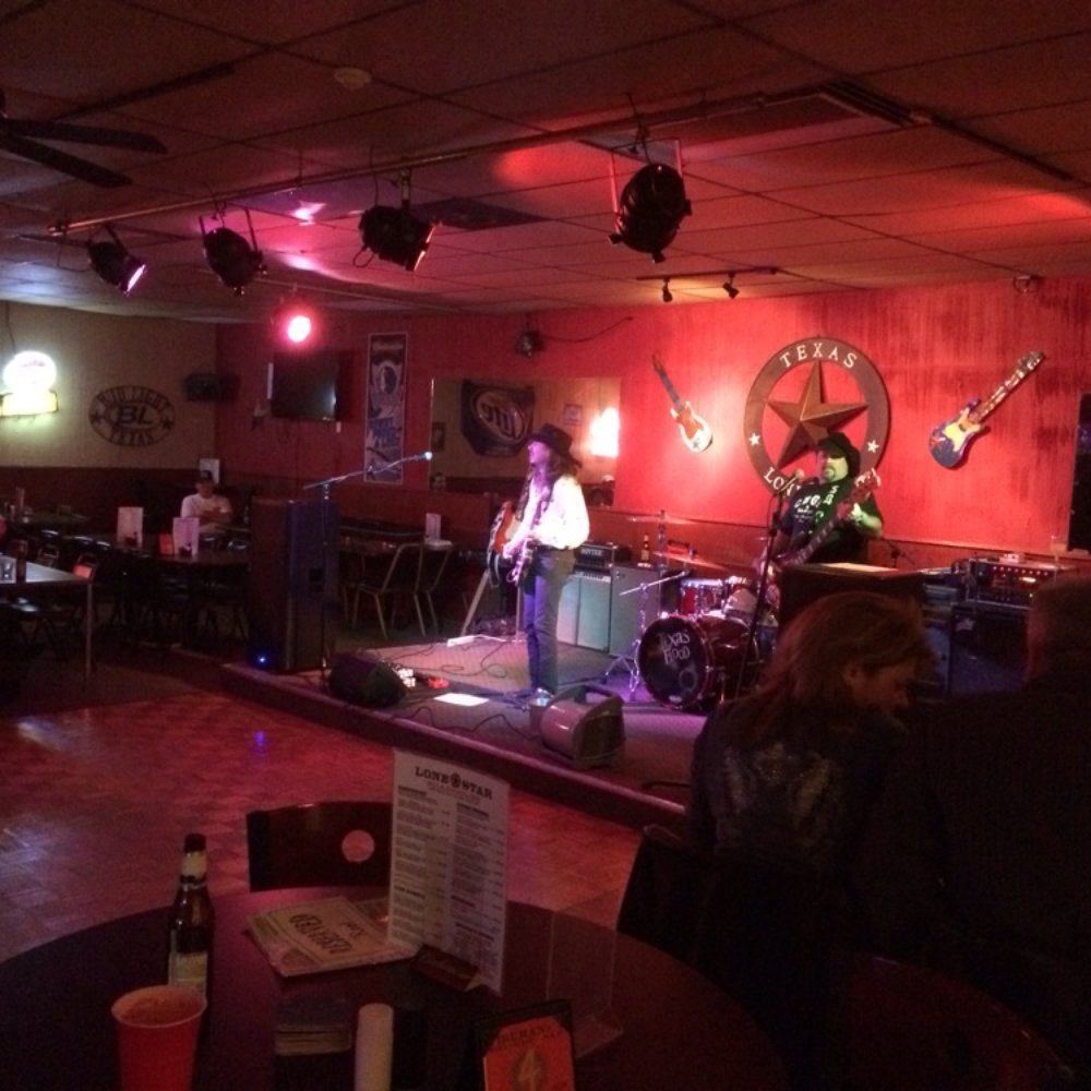 Lone Star Roadhouse - a band performing on stage - Bars Near Me - Dallas, Texas Lone Star Roadhouse - a band performing on stage - Bars Near Me - Dallas, Texas