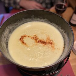 Restaurant Bären - Cheese fondue for two (comes with bread, tomato, onions, pickles, potatoes, not shown, 68 CHF)