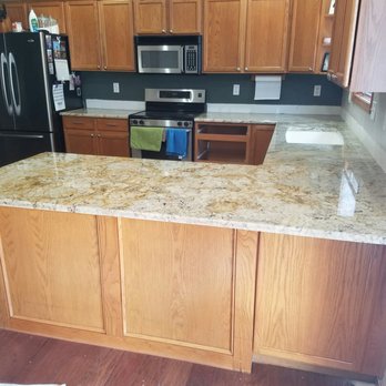 Granite Solutions - a kitchen with a granite countertop - Countertop Installation Near Me - Elkhart, Iowa Granite Solutions - a kitchen with a granite countertop - Countertop Installation Near Me - Elkhart, Iowa