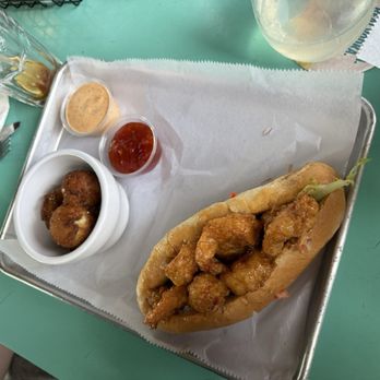 Sliders Oyster Bar - Shrimp Po'Boy with Hushpuppies - Seafood Near Me - Neptune Beach, Florida Sliders Oyster Bar - Shrimp Po'Boy with Hushpuppies - Seafood Near Me - Neptune Beach, Florida