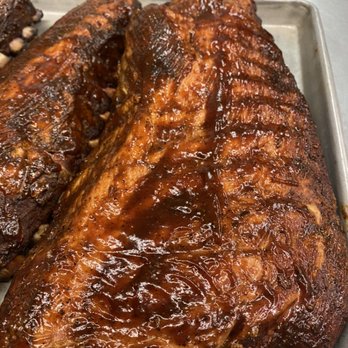 Slab Daddy's BBQ Catering - Baby back ribs ready to be glazed in our smoker - Barbeque Near Me - Spring Mill, Kentucky Slab Daddy's BBQ Catering - Baby back ribs ready to be glazed in our smoker - Barbeque Near Me - Spring Mill, Kentucky