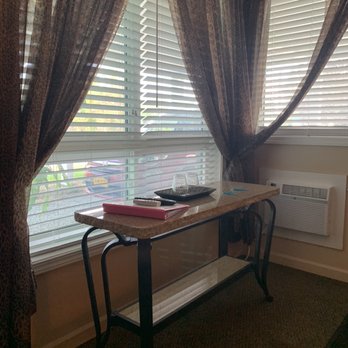 Miami Motel - Perfect table for keys, wallets and purses. There was also a binder with local info. - Hotels Near Me - Canandaigua, New York Miami Motel - Perfect table for keys, wallets and purses. There was also a binder with local info. - Hotels Near Me - Canandaigua, New York
