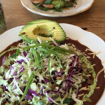 Kitchen Mouse Cafe - Huevos Rancheros in the front. Breakfast sandwich in the back. - Vegan Near Me - Los Angeles, California
