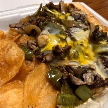Bridgewater Bank Tavern - Rib-Eye Steak Hoagie with house-made pub chips - Burgers Near Me - Saline, Michigan Bridgewater Bank Tavern - Rib-Eye Steak Hoagie with house-made pub chips - Burgers Near Me - Saline, Michigan