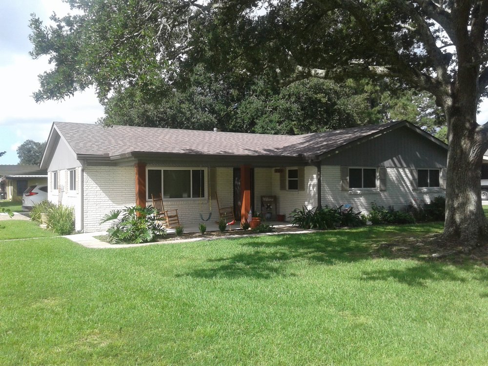 Slide of Pelican Roofing