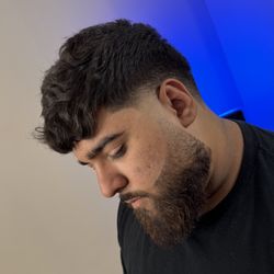 Concept Hair Studio - Mid Taper Textured top on wavy hair