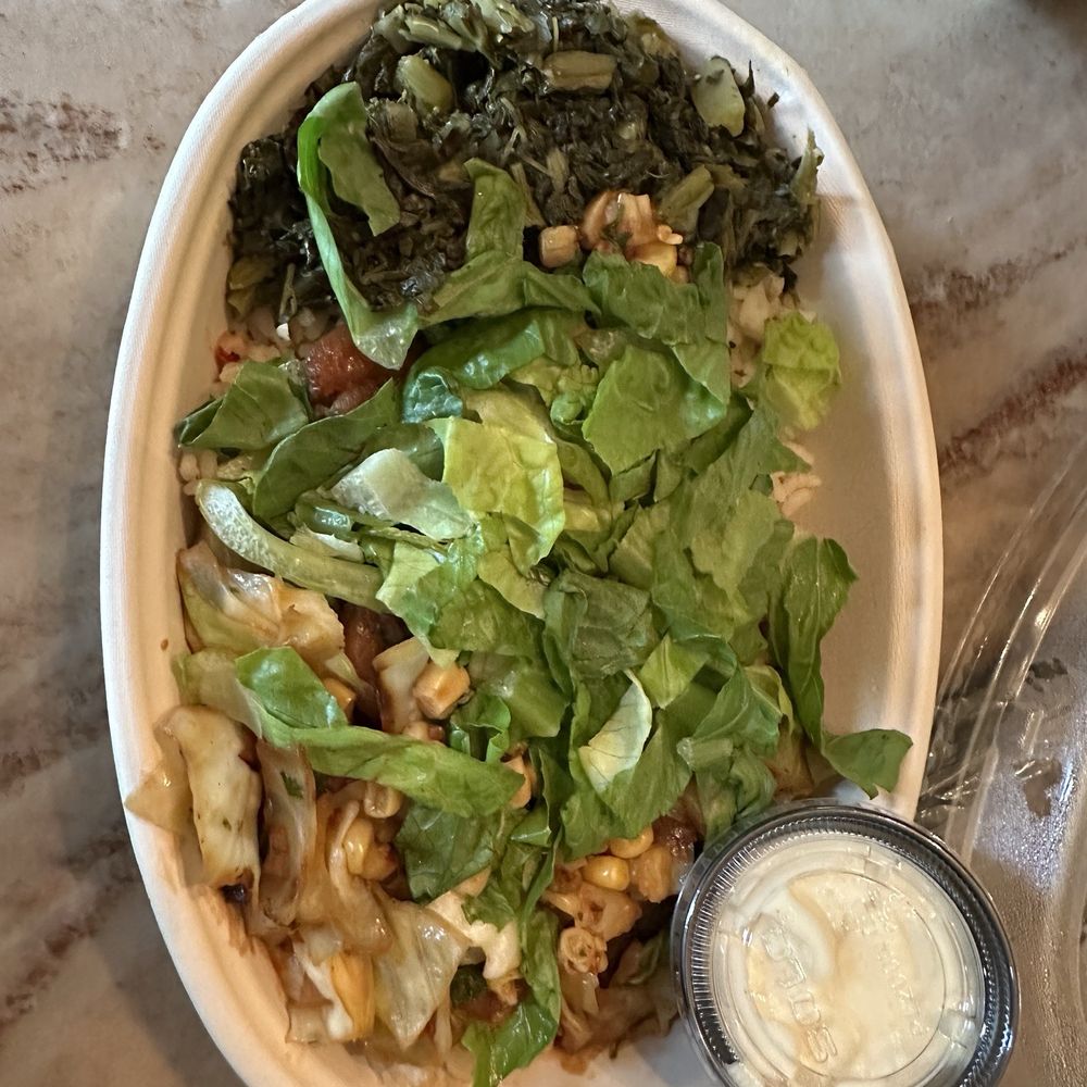 Bowl ( shrimp ettouffee, rice, corn,lettuce, greens