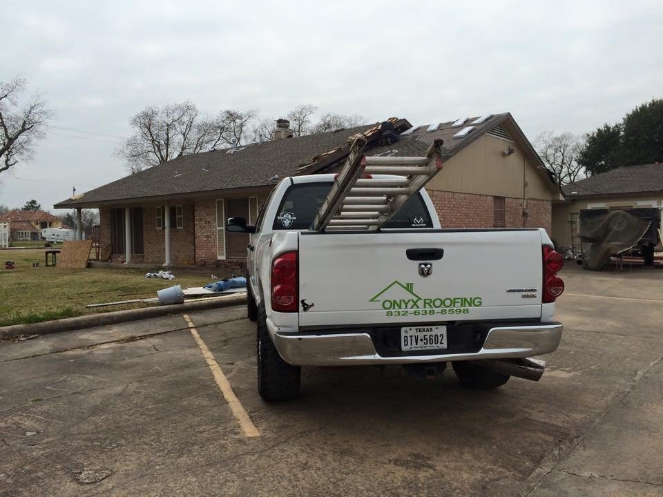 Slide of Onyx Roofing