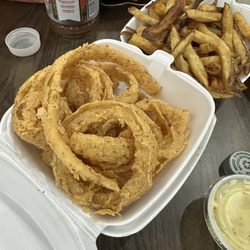 Cajun Kitchen Seafood & Poboys - Onion rings and fries.