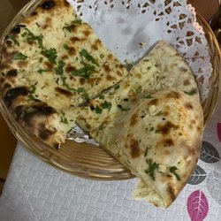 New Red Fort - Half of the garlic naan. It comes with four large pieces.