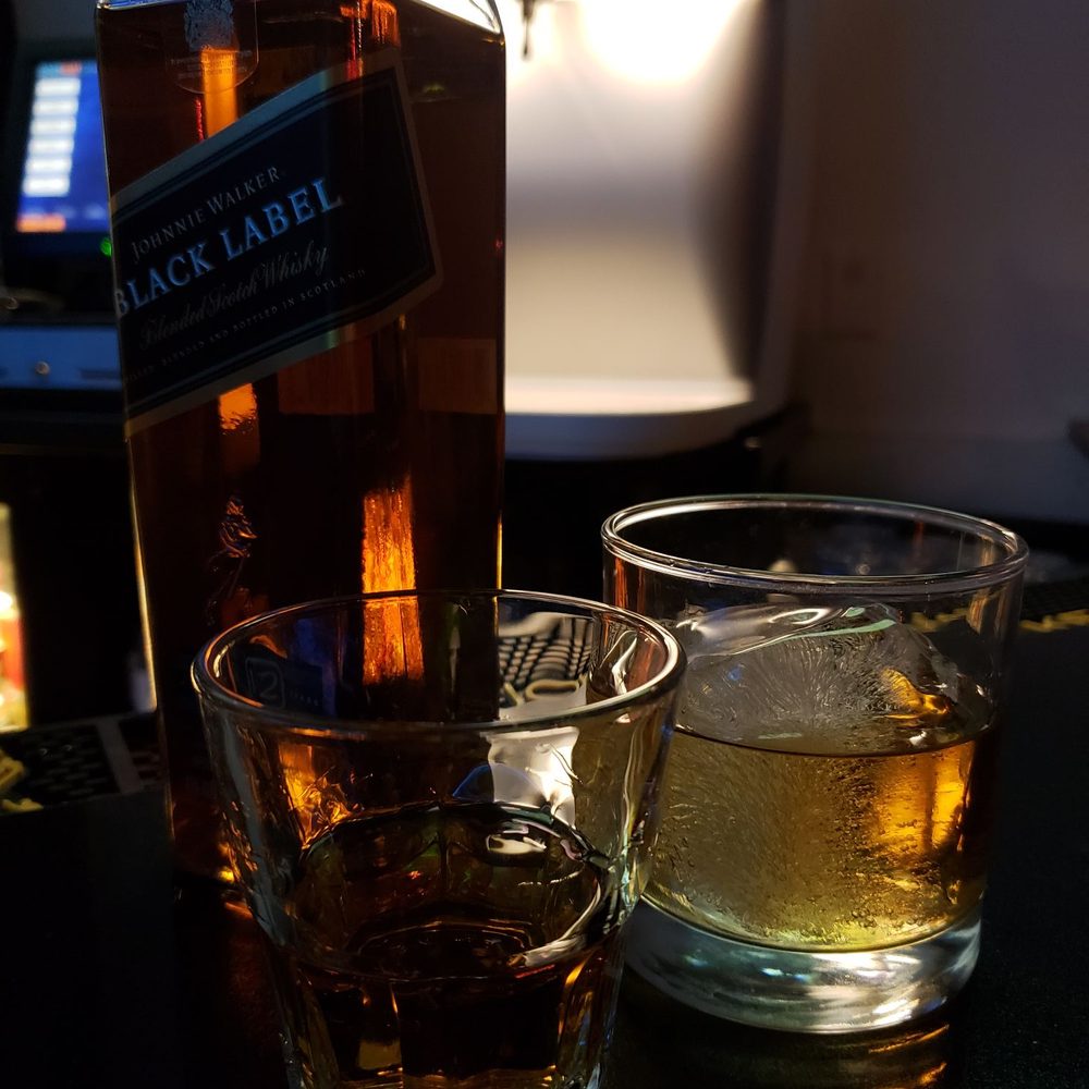 Cafe Bleu - Happy hour bottle - Sports Bars Near Me - Los Angeles, California