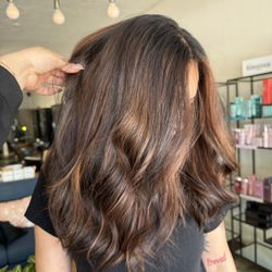 Salon Solè Color Bar and Extensions - Beautiful brownie brown Baliage with a Carmel swirl on this beauty