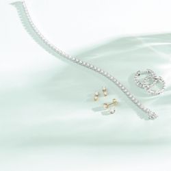 Segal & Co Fine Jewelers - Diamond tennis bracelet, and diamond earrings