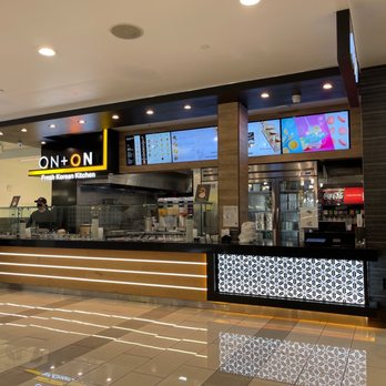 ON + ON Fresh Korean Kitchen - a woman standing in front of the counter - Asian Fusion Near Me - Culver City, California