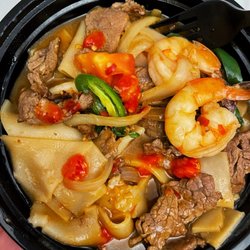 Bangkok House Thai Cuisine - Shrimp and Beef drunken noodles (I asked for extra spicy and it was literally extra spicy , just the way I liked it)