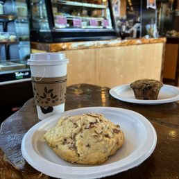Almond raisin scone . Blueberry muffin