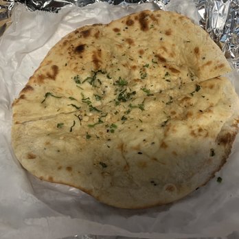 Zeera Indian Restaurant - Garlic Naan - Indian Near Me - Fuquay Varina, North Carolina Zeera Indian Restaurant - Garlic Naan - Indian Near Me - Fuquay Varina, North Carolina