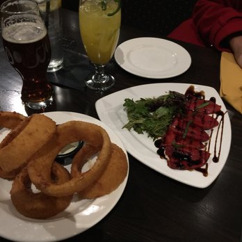 Local Goat - Piquillo peppers stuffed w goat cheese and half-order of 1" width sliced onion rings - New American Near Me - Pigeon Forge, Tennessee Local Goat - Piquillo peppers stuffed w goat cheese and half-order of 1" width sliced onion rings - New American Near Me - Pigeon Forge, Tennessee