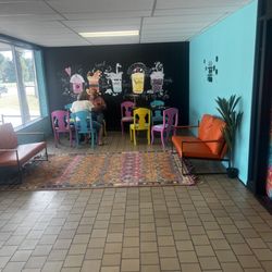 Wild Moon Boba & Bowls - Seating and boba mural
