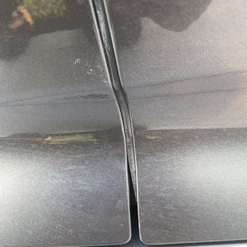 Memorial Collision Center  - Door seals painted over. - Body Shops Near Me - Houston, Texas