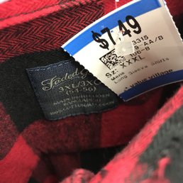 Used Walmart shirt, barely less expensive than a new one. Probably more if you add your bus fare or gas to get there.